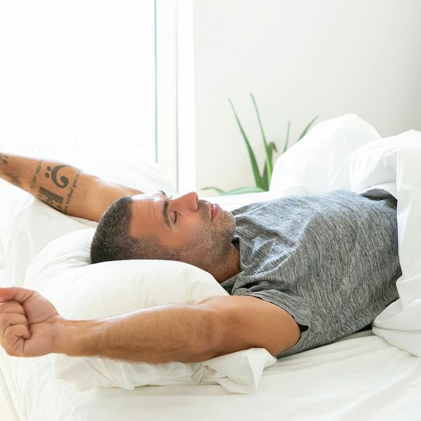 Person stretching gently, feeling energized and refreshed.
